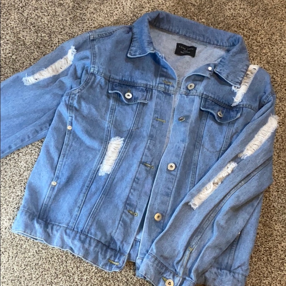Oversized distressed jean jacket.